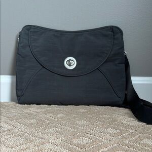 Baggallini Black Crossbody Bag with Textured Fabric and Flap Closure